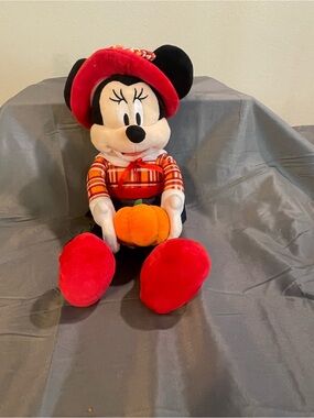 Disney Minnie Mouse Plush in Red Outfit Holding Orange Pumpkin
